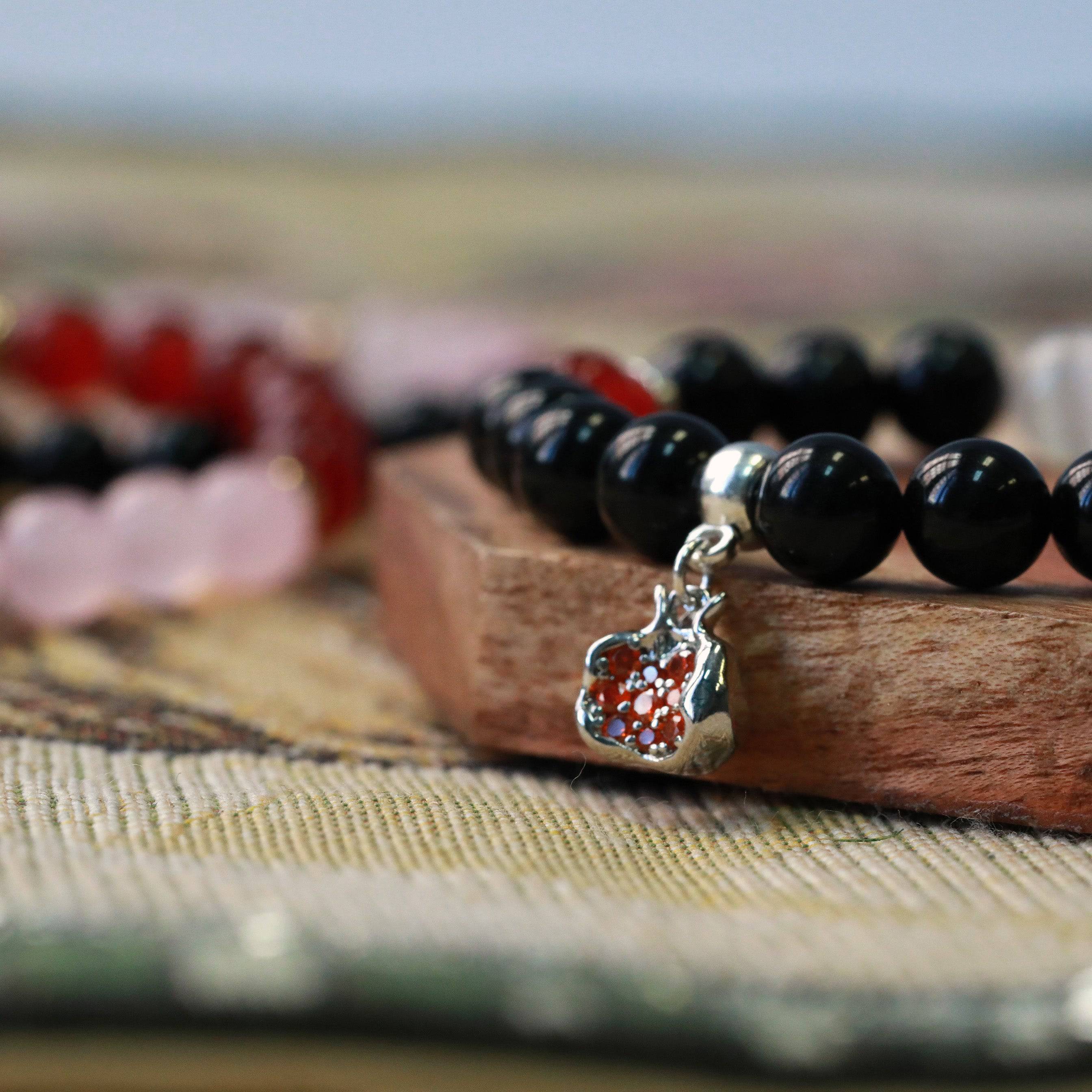 pomegranate gemstone stretchy charm bracelet in gold or silver inspired by Persephone and Hecate closeup vew 2 hecate