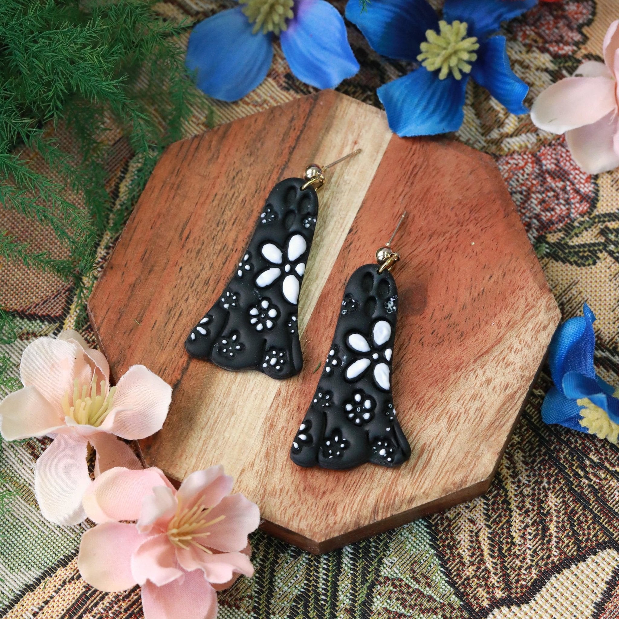 daisy ghost clay earrings in black and white by everything ky and i black top image
