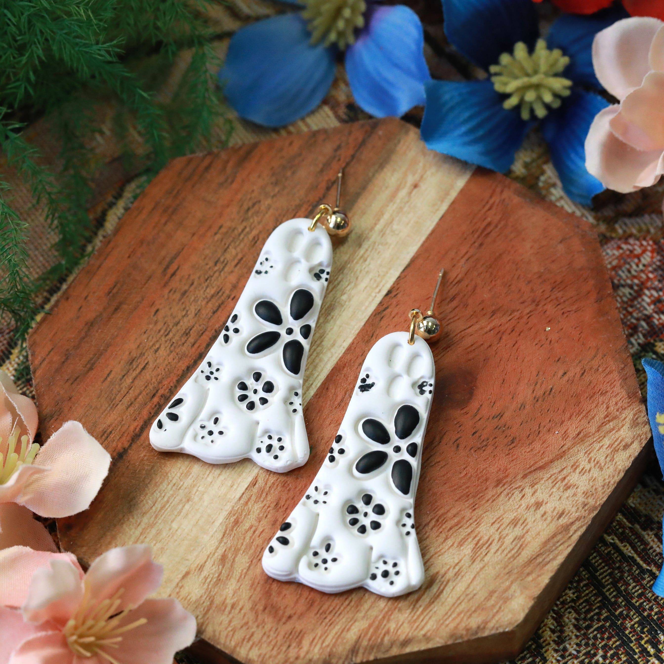 daisy ghost clay earrings in black and white by everything ky and i white top image