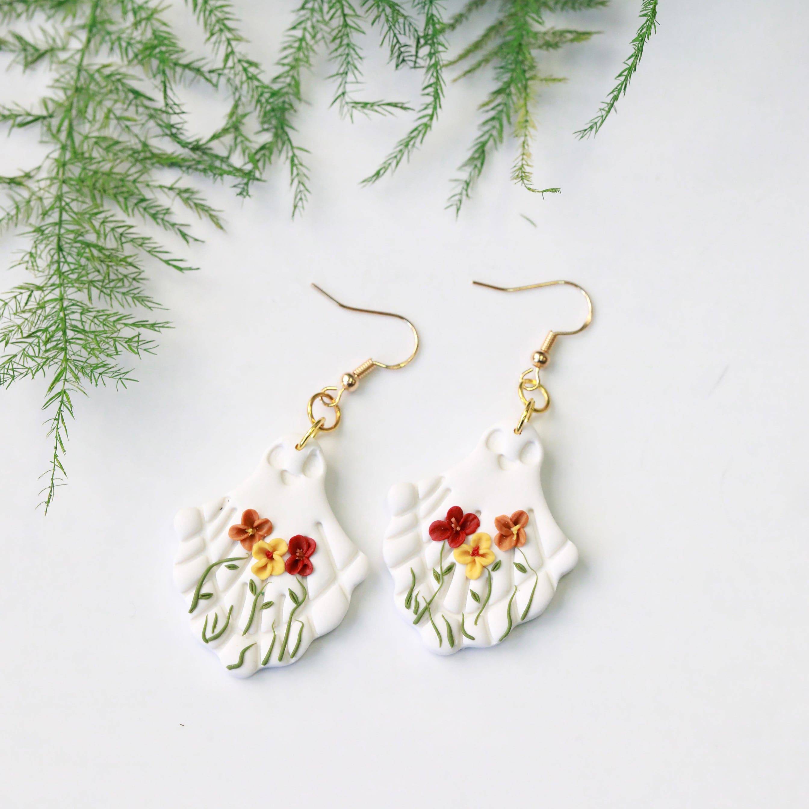 flower happy clay ghost earrings from everything ky and i white image