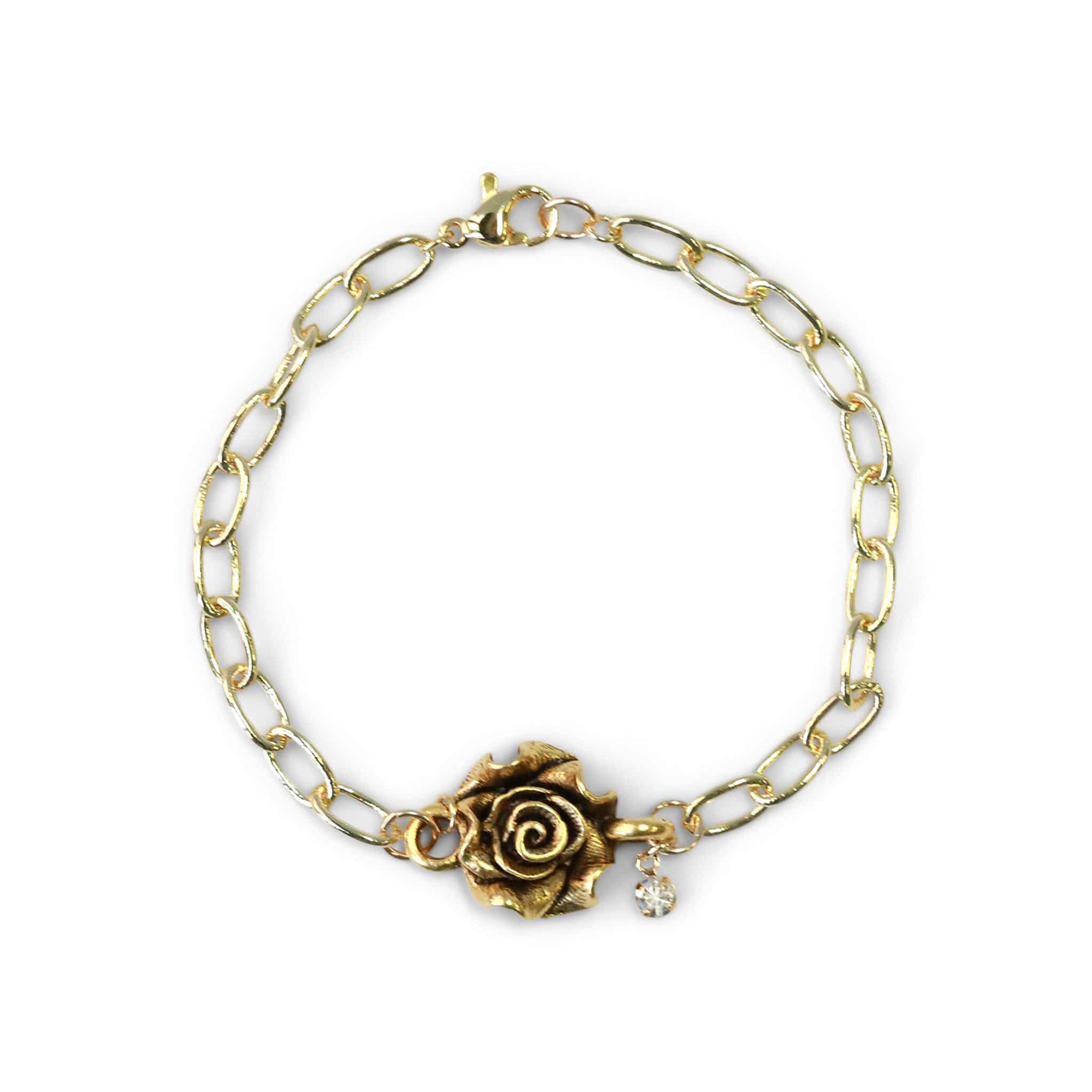 gold rose connector bracelet with crystal charm on gold plated chain cover image