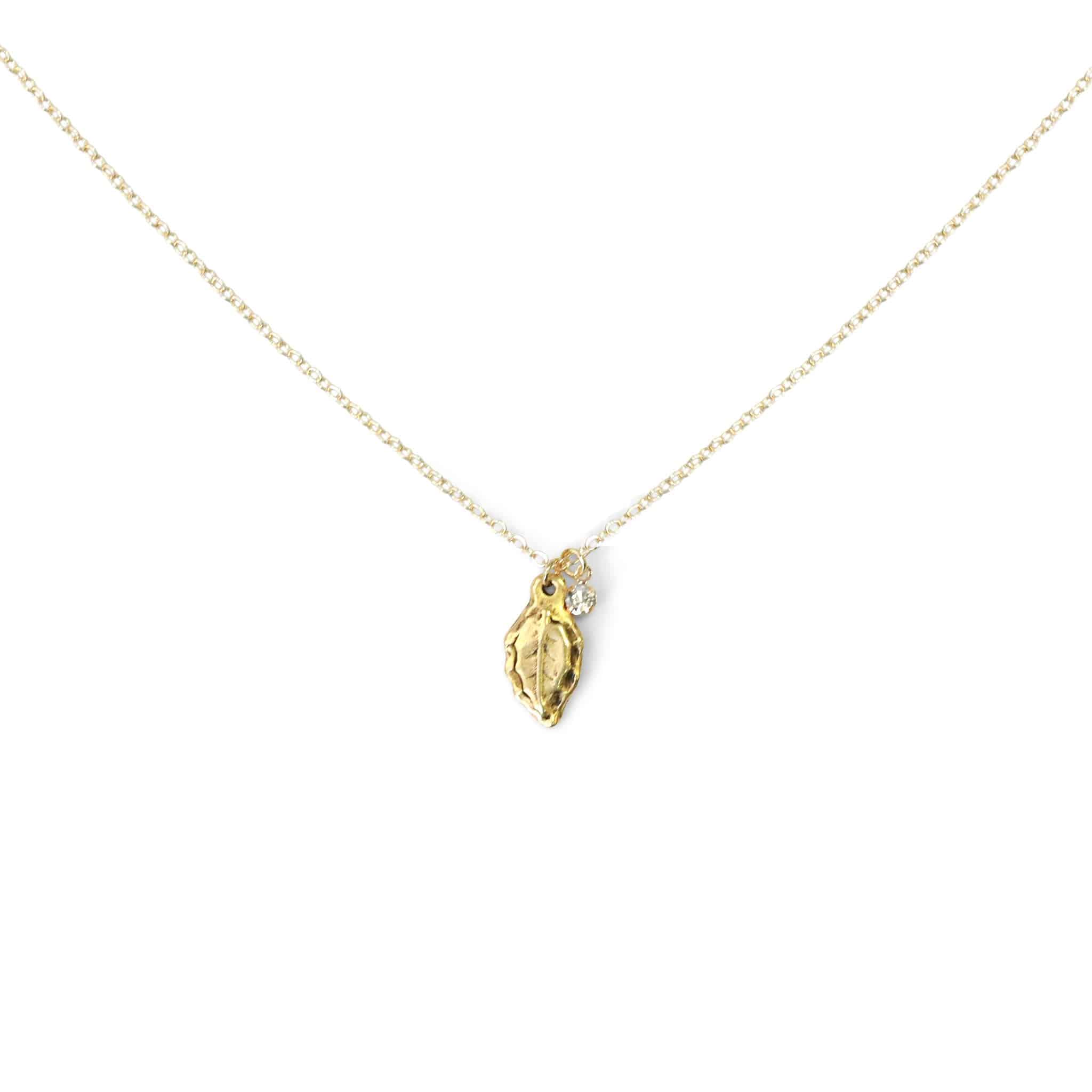 gold leaf charm necklace with crystal charm cover image